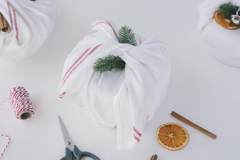 Use your Stojo as the wrapping and just add a bow on top!